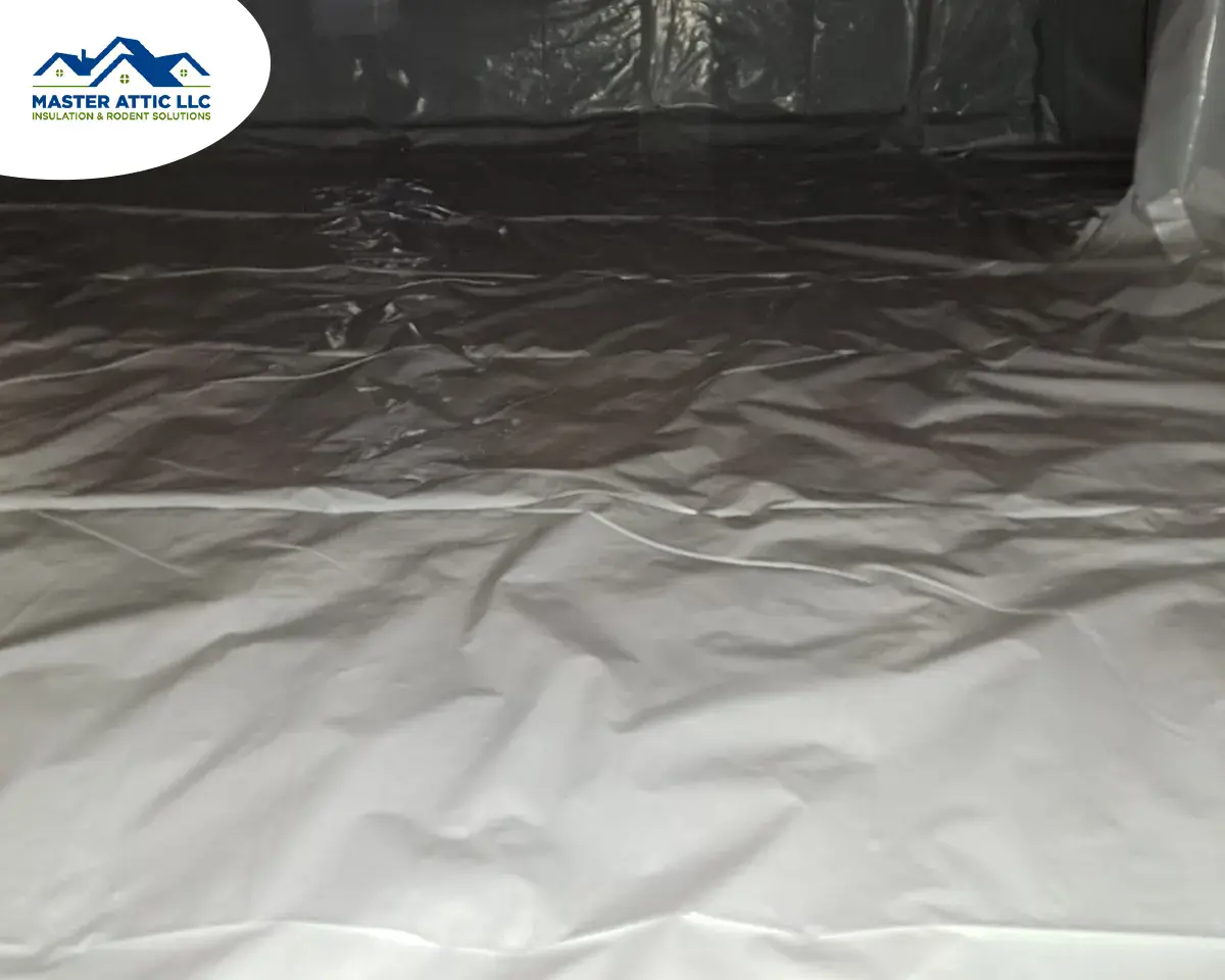 Sealed crawl space insulation with reflective vapor barrier in a Central New Jersey home.