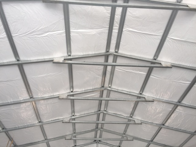 Insulation removal and replacement for commercial buildings.